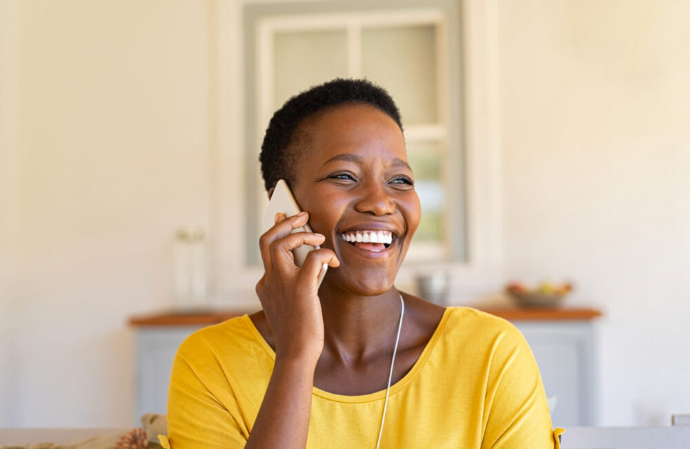 Smiling African American Woman Talking On Phone